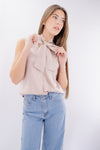 Blusa smanicata con fiocco