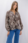 Camicia con volant e motivo floreale