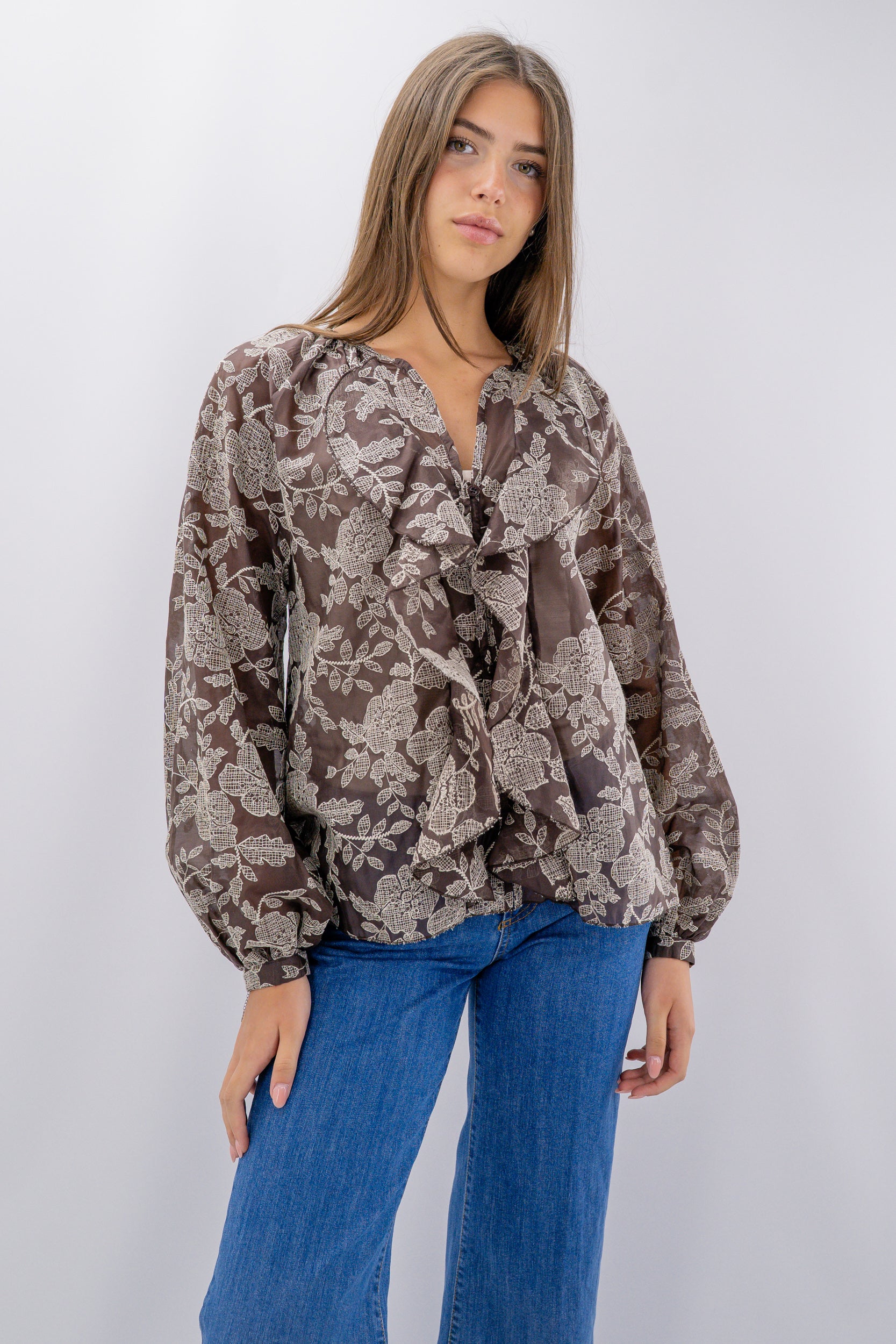 Camicia con volant e motivo floreale