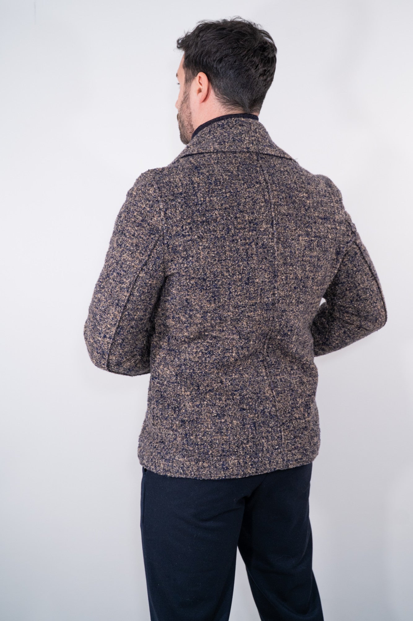 Cappotto doppiopetto in tessuto bouclé con ampio rever