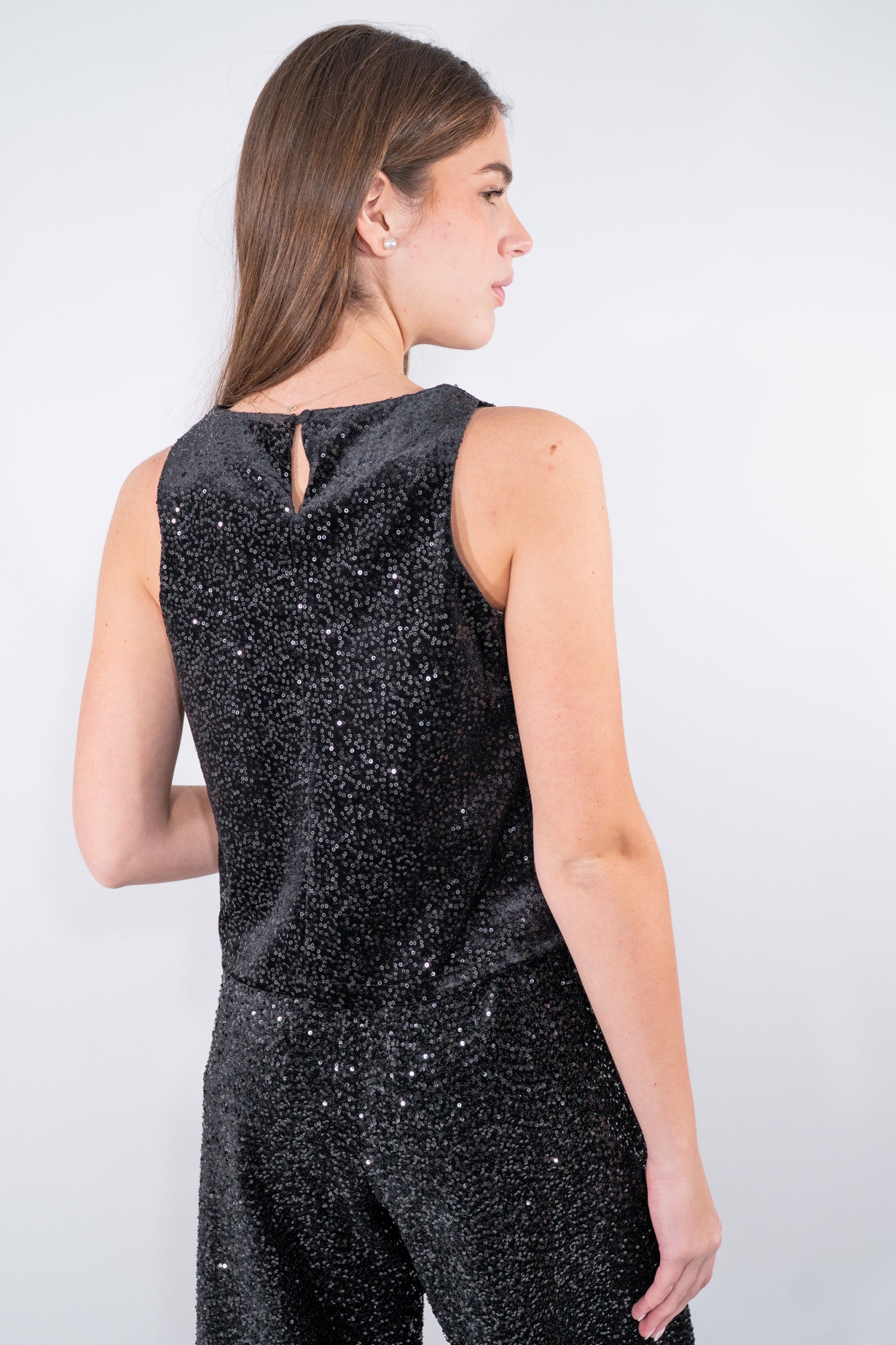 Top smanicato con paillettes
