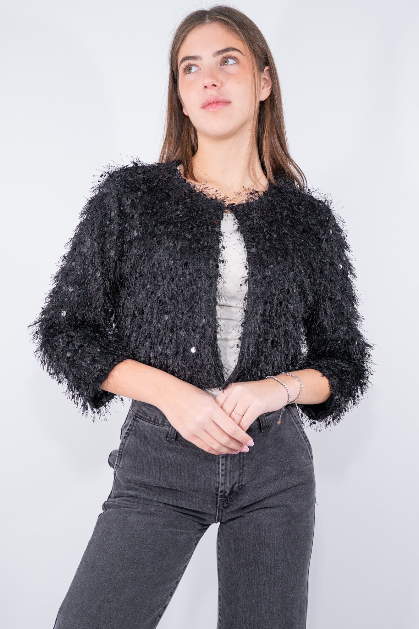 Giacchino coprispalle con  frange e paillettes