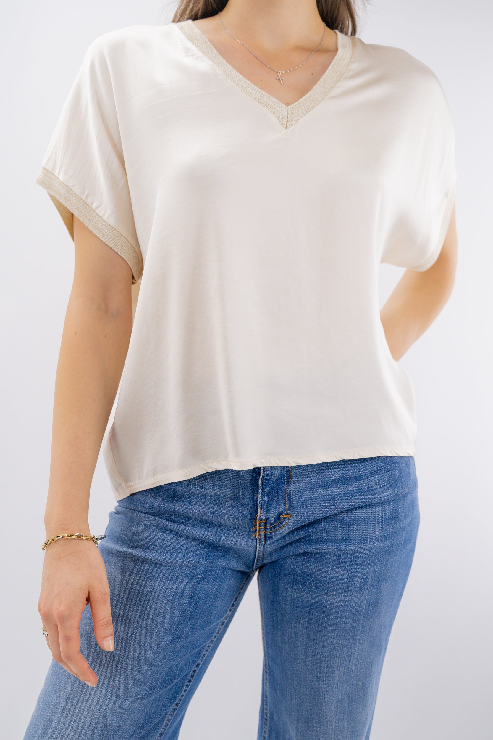 Blusa scollo a V con profili lurex