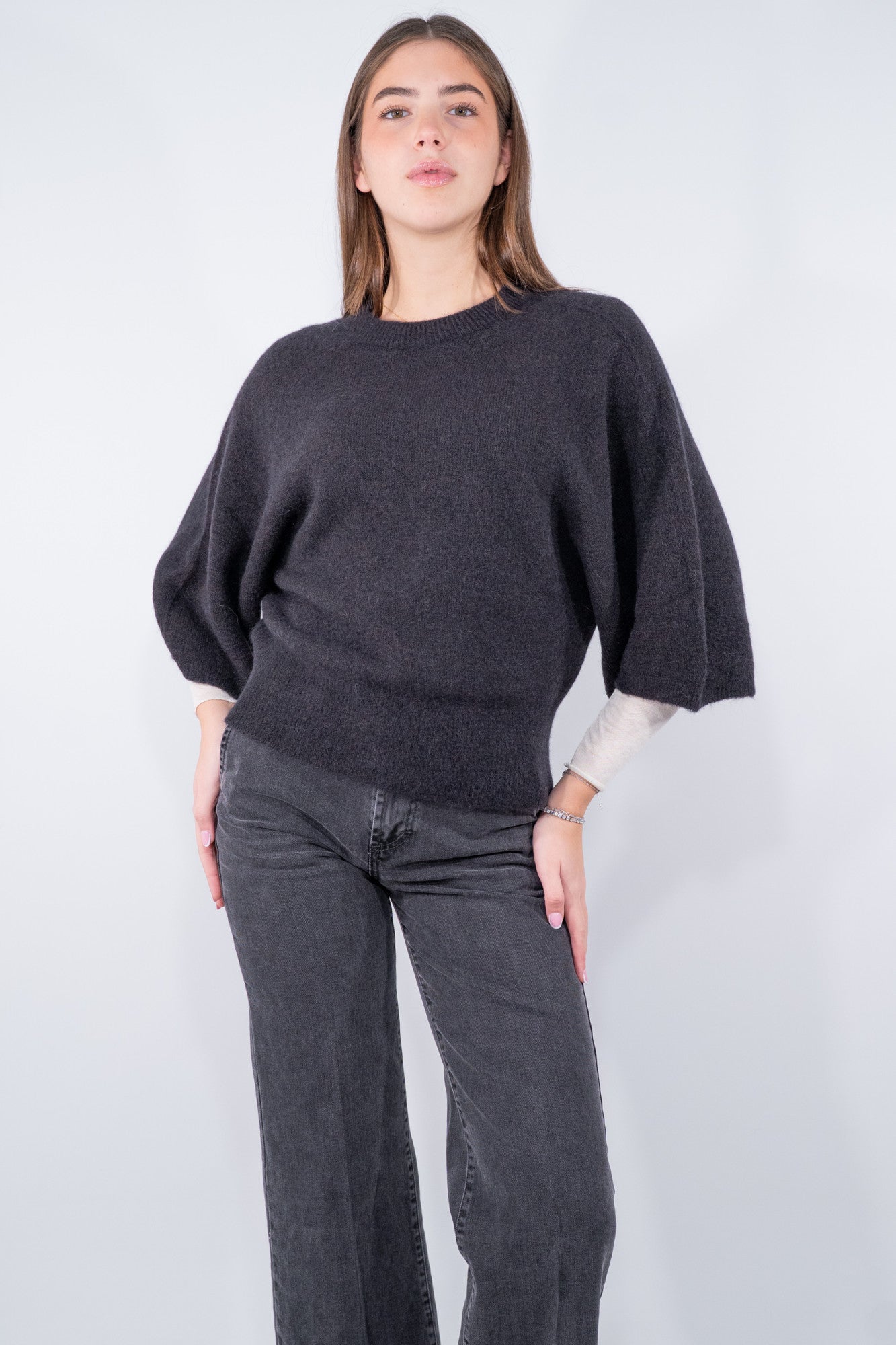 Maglia con linea a pipistrello manica al gomito