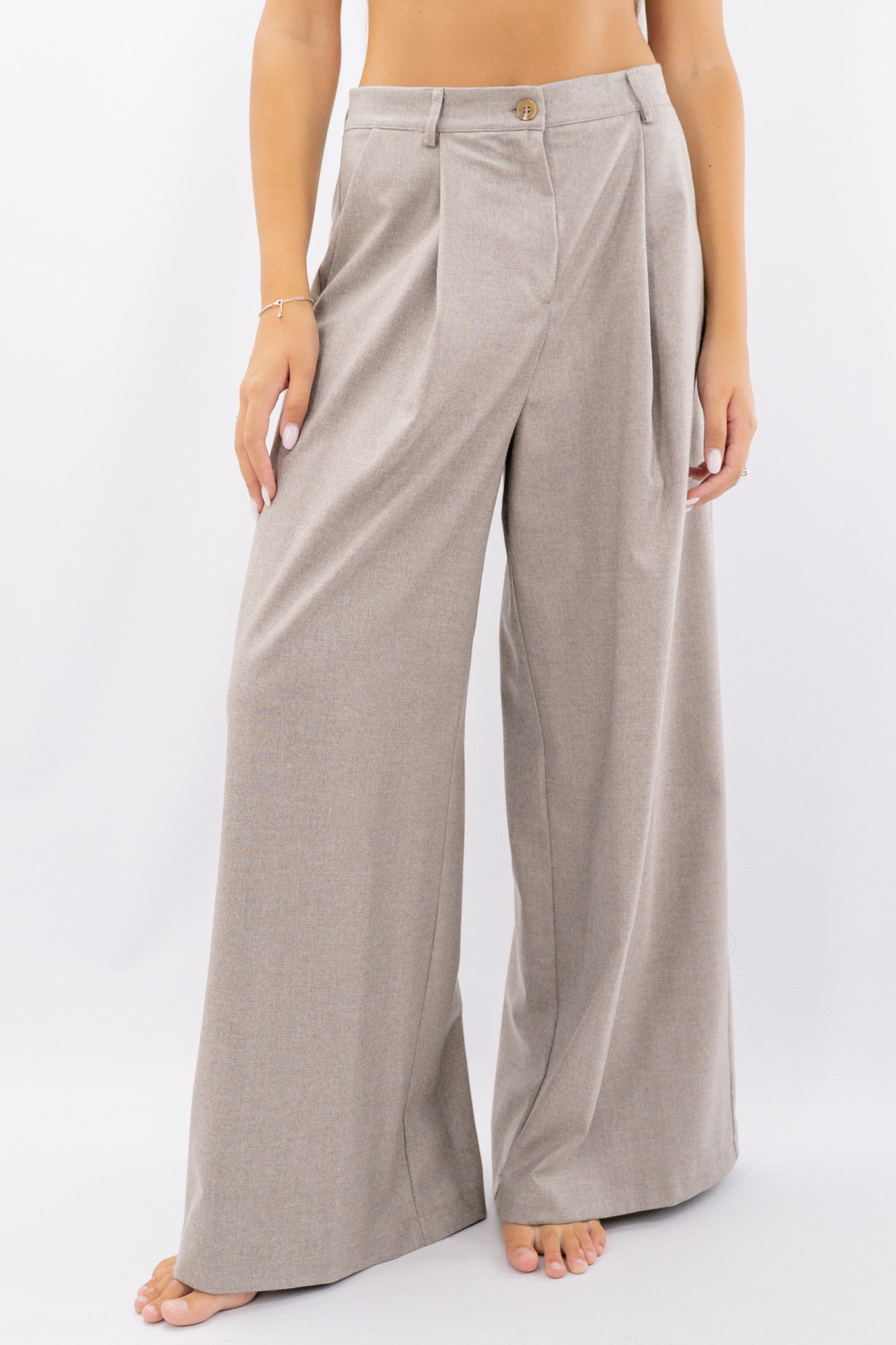 Pantalone palazzo in texture operata con pinces