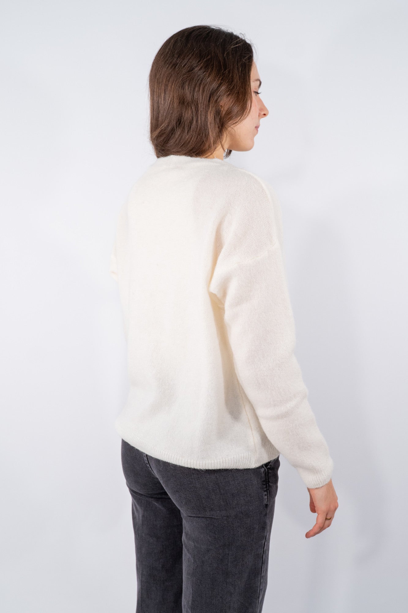 Cardigan soffice con chiusura a bottoni e scollo a V