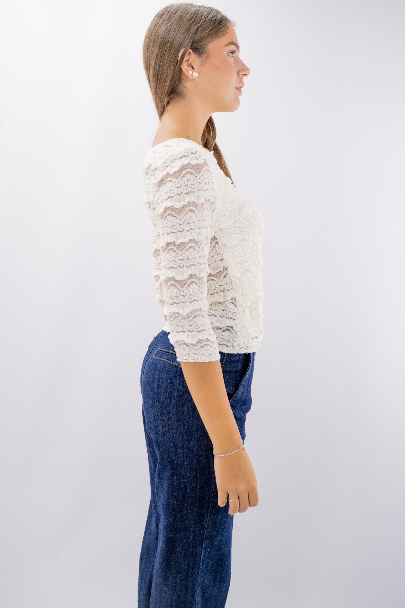 Maglia in pizzo elasticizzato goffrato