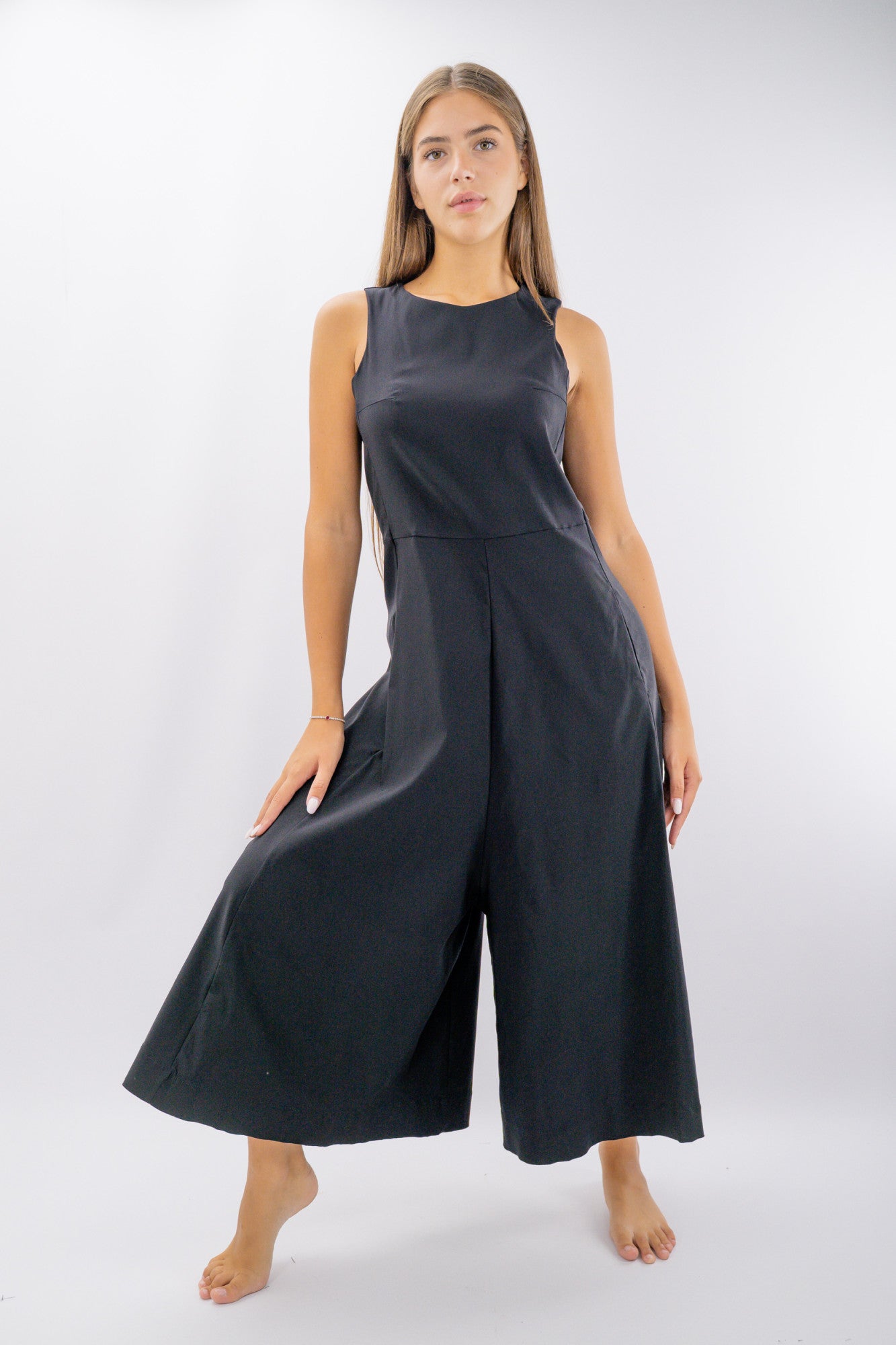 Tuta cropped a palazzo in texture elasticizzata