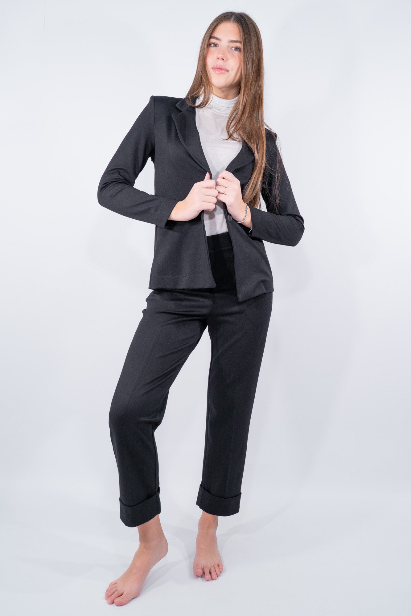 Pantalone con risvolto in punto Milano obliquo.