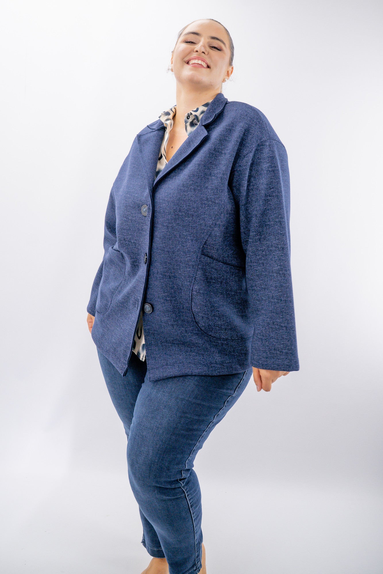 Cappottino a microtrama con maxi tasche e rever