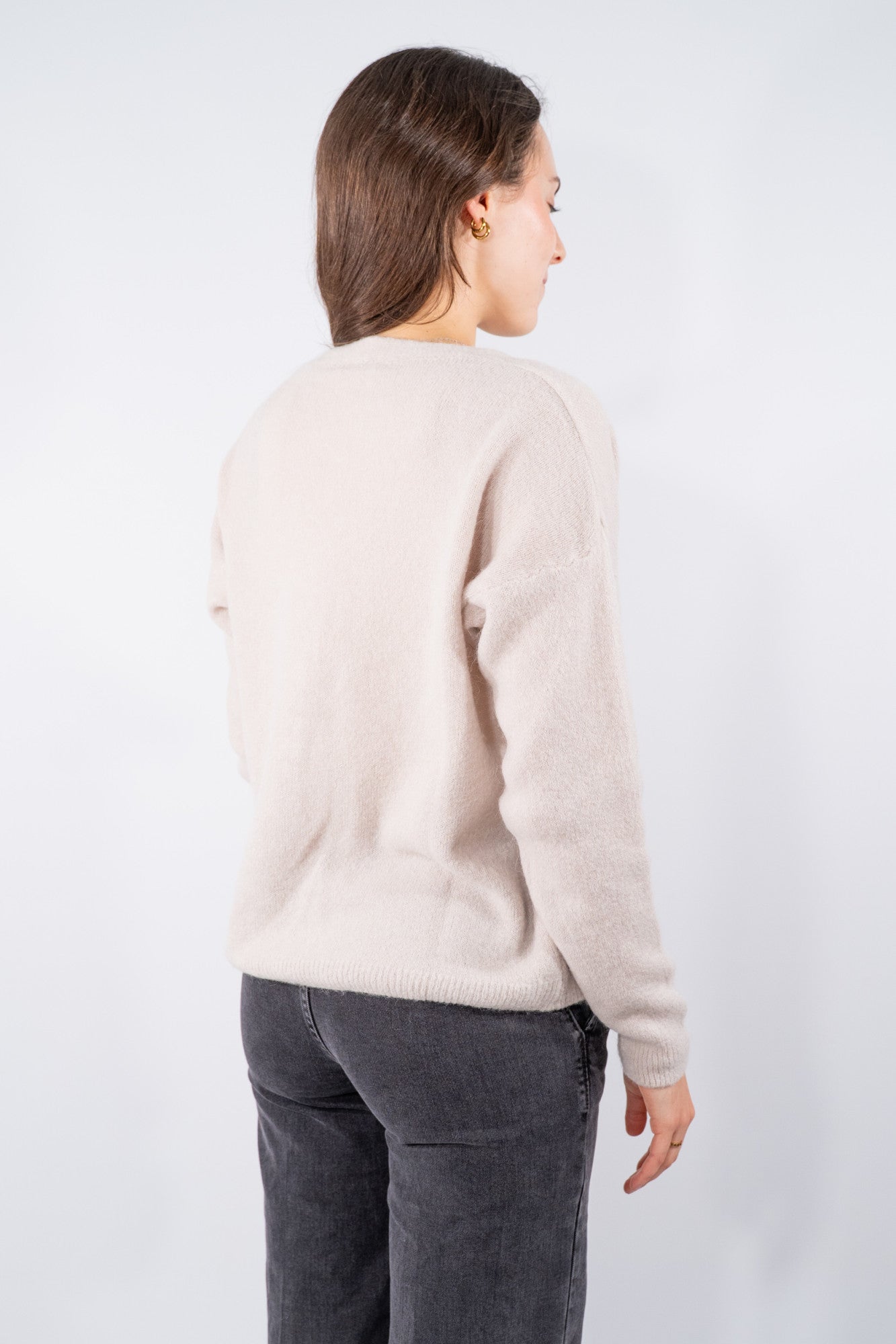 Cardigan soffice con chiusura a bottoni e scollo a V