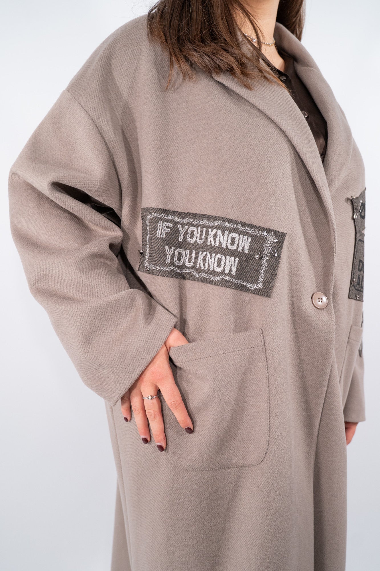 Cappotto over con dettagli stampati e maxi tasche applicate