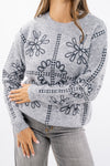 Maglia girocollo con fantasia motivo fiori ricamati