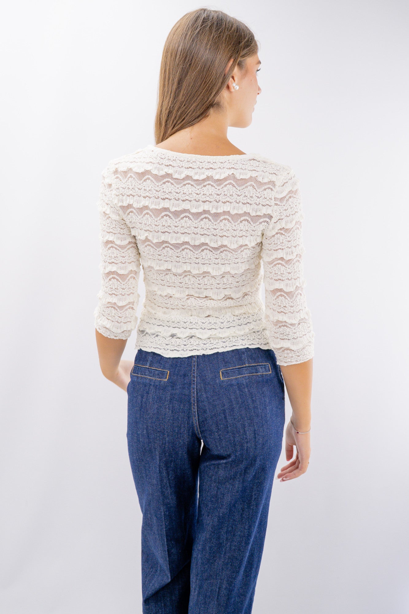 Maglia in pizzo elasticizzato goffrato